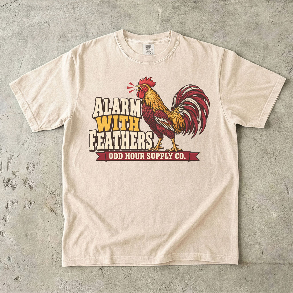 Comfort Colors 1717 T-Shirt in Ivory mit dem Motiv Alarm With Feathers, Vorderansicht